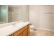 This bathroom has a shower and tub combination with a white sink at 7021 New Dale Rd, Rex, GA 30273