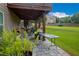 This home offers a lush backyard with a charming covered patio and outdoor space perfect for entertaining guests at 3015 Guardian Nw Walk, Kennesaw, GA 30152