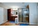 Stylish bathroom featuring a glass-enclosed shower and a dark wood vanity at 3015 Guardian Nw Walk, Kennesaw, GA 30152