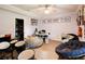 Bedroom with a music theme including a drum set, guitars, and cozy seating at 3015 Guardian Nw Walk, Kennesaw, GA 30152