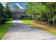 Charming two-story brick home featuring an attached two-car garage and mature landscaping at 3015 Guardian Nw Walk, Kennesaw, GA 30152