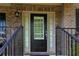Close up of a front door with sidelights and black hardware at 3015 Guardian Nw Walk, Kennesaw, GA 30152