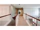 Bright hallway with detailed trim and banister leading to other rooms in the home at 3015 Guardian Nw Walk, Kennesaw, GA 30152
