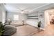 Basement living room featuring built in cabinets and shelving at 3015 Guardian Nw Walk, Kennesaw, GA 30152