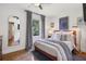 Comfortable bedroom featuring hardwood floors, an area rug and natural lighting at 502 Hascall Nw Rd, Atlanta, GA 30309