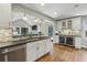 A spacious kitchen with hardwood floors, stainless steel appliances, and a wine cooler at 502 Hascall Nw Rd, Atlanta, GA 30309