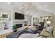 Comfortable living area features a fireplace, built-ins, and an open view of the modern kitchen at 502 Hascall Nw Rd, Atlanta, GA 30309