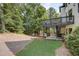 Spacious backyard featuring a multi-tiered deck and patio and a playground at 2295 Abbey Cove Ct, Marietta, GA 30062