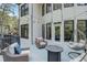 Outdoor deck featuring string lights, a fire pit, comfortable seating, and backyard view at 2295 Abbey Cove Ct, Marietta, GA 30062