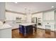 Modern kitchen with stainless steel appliances, a center island, and sleek white cabinetry at 2295 Abbey Cove Ct, Marietta, GA 30062