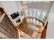 Open living room with a fireplace, large windows, and hardwood floors at 2295 Abbey Cove Ct, Marietta, GA 30062