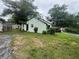 The backyard of the home has a partially fenced yard and grass at 4125 N Dearing Ne St, Covington, GA 30014