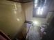 Bathroom featuring tiling and a window at 4125 N Dearing Ne St, Covington, GA 30014