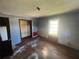 A bedroom with hardwood flooring is waiting for its renovation at 4125 N Dearing Ne St, Covington, GA 30014