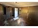 Bedroom with a closet and damaged flooring at 4125 N Dearing Ne St, Covington, GA 30014