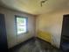 Bedroom featuring a window and hardwood floors at 4125 N Dearing Ne St, Covington, GA 30014