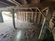 The interior of the garage showcases wooden support beams, exposed walls, and a rustic unfinished aesthetic at 4125 N Dearing Ne St, Covington, GA 30014