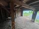 Inside the detached garage, raw construction with wooden supports, walls and a partial view of the exterior at 4125 N Dearing Ne St, Covington, GA 30014
