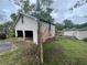 Exterior garage with detached parking space and garden at 4125 N Dearing Ne St, Covington, GA 30014