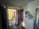 Hallway of property that requires updates and renovations at 4125 N Dearing Ne St, Covington, GA 30014