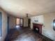Spacious living room features a fireplace, hardwood floors, and natural light from the exterior doors at 4125 N Dearing Ne St, Covington, GA 30014