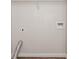 A utility area with laminate floors, ready for washer and dryer hookups at 711 Ashley Ln, Stone Mountain, GA 30087