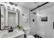 Modern bathroom features a glass enclosed shower with black hardware and subway tile surround at 2550 Laurel Ridge Dr, Decatur, GA 30033