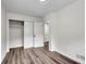 Spacious bedroom featuring hardwood floors and a closet for storage at 2550 Laurel Ridge Dr, Decatur, GA 30033