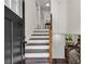 Entryway featuring wooden stairs and modern railings at 2550 Laurel Ridge Dr, Decatur, GA 30033