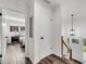 Hallway with wood flooring and a view into the bedroom showcasing a comfortable bed at 2550 Laurel Ridge Dr, Decatur, GA 30033