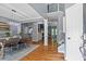 Bright open-concept living area with hardwood floors, dining area, and easy flow to the living room at 428 Gold Xing, Canton, GA 30114
