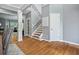 Entryway featuring hardwood floors, a staircase, and abundant natural light, creating a welcoming atmosphere at 428 Gold Xing, Canton, GA 30114