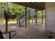 Brick patio featuring stairs leading to backyard with a fenced perimeter and lush green lawn at 428 Gold Xing, Canton, GA 30114