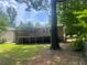 The large backyard with a wooden deck is ideal for outdoor entertaining at 4434 Janice Dr, Snellville, GA 30039