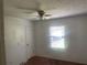 Bedroom with neutral walls, carpet flooring, and bright window at 4434 Janice Dr, Snellville, GA 30039