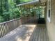 Spacious wood deck surrounded by lush greenery at 4434 Janice Dr, Snellville, GA 30039
