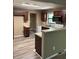 Updated kitchen with modern appliances, stone countertops and dark cabinets at 4434 Janice Dr, Snellville, GA 30039
