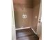 A dedicated laundry room offers shelving, modern flooring, a hookup, and access to the outside at 4434 Janice Dr, Snellville, GA 30039