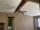 Open living space features ceiling fan, beam and transition to hallway at 4434 Janice Dr, Snellville, GA 30039