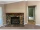 Living room with stone fireplace and open floor plan at 4434 Janice Dr, Snellville, GA 30039