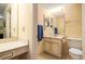 This bathroom features dual sinks, vanity, and a neutral color scheme at 7098 Stonington Dr, Atlanta, GA 30328