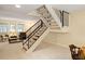 Inviting interior featuring natural light, carpet flooring, and staircase that leads to another level at 7098 Stonington Dr, Atlanta, GA 30328