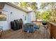Inviting outdoor patio with grill and seating area, perfect for entertaining and enjoying the backyard at 963 Turner Se Dr, Smyrna, GA 30080