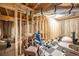 Unfinished basement with visible framing, utilities, and a blank canvas for future customization at 963 Turner Se Dr, Smyrna, GA 30080