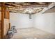 Clean unfinished basement with white-painted walls, ready for new owner's customizations at 963 Turner Se Dr, Smyrna, GA 30080