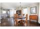 Open dining room and kitchen with hardwood floors and neutral color palette at 963 Turner Se Dr, Smyrna, GA 30080