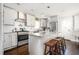 Updated kitchen with granite countertops, subway tile backsplash, and stainless appliances at 963 Turner Se Dr, Smyrna, GA 30080