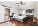 Primary bedroom featuring a king bed with an ensuite bathroom featuring a standalone tub at 963 Turner Se Dr, Smyrna, GA 30080