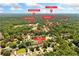 Aerial view highlights home's proximity to Autrey Mill Middle, Dolvin Elementary and Montessori at 560 Edgehill Pl, Johns Creek, GA 30022