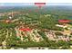 Aerial view highlights home's proximity to Johns Creek High School and Dolvin Elementary at 560 Edgehill Pl, Johns Creek, GA 30022